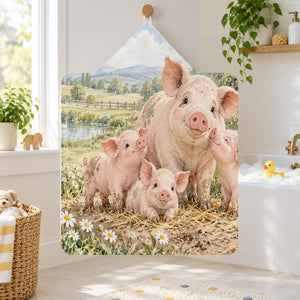 Piglet Family Farm kids hooded bath towel hanging in a kids bathroom
