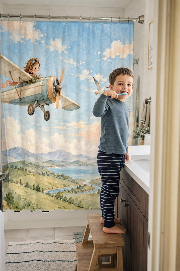 Child brushing teeth in a family bathroom with the Vintage Airplane shower curtain
