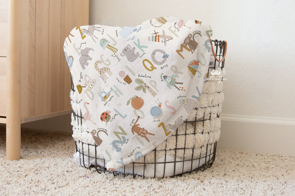 Vintage Baby Animals Safari blanket for infants, featuring adorable animal prints in soft, cozy fabric.