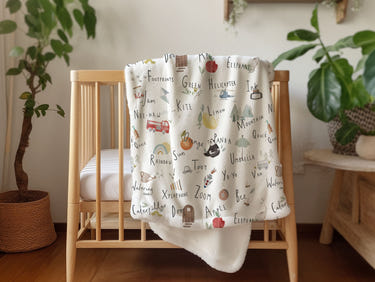 Vintage baby blanket featuring colorful alphabet design, perfect for keeping your little one cozy and stylish.