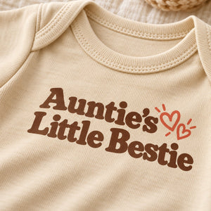 Close-up of the Auntie's Little Bestie baby bodysuit print