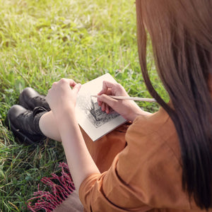 "Sketchbook Art Kit for babies featuring doodle set with paper and pencils, perfect for creative activities."