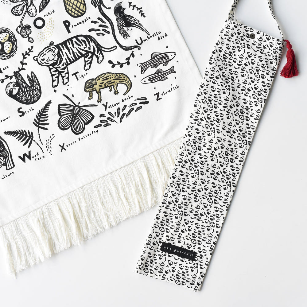 Jungle Alphabet Tapestry for nursery decor featuring colorful letters and playful animal designs.