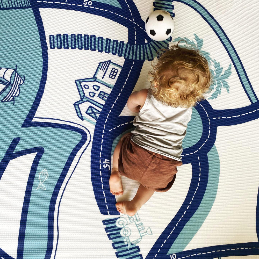 Dakota Blue Shwally Playmat for babies, featuring a soft, colorful design perfect for playtime and tummy time.