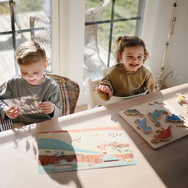 Colorful wooden dino puzzle for babies, showcasing vibrant pieces at an angle for engaging play and learning.