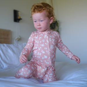 Shwally Romper for babies, stylish design, angle view showcasing soft fabric and vibrant colors.