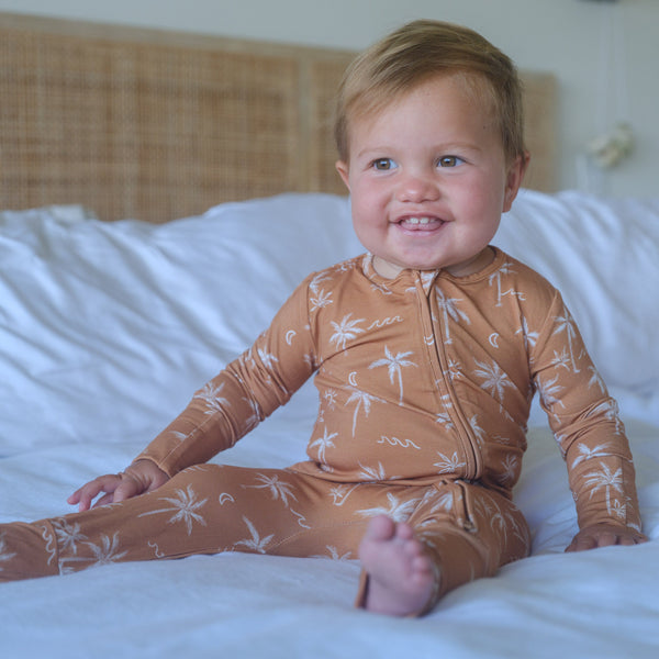 Shwally Romper for babies, stylish design, angle view showcasing soft fabric and playful colors.