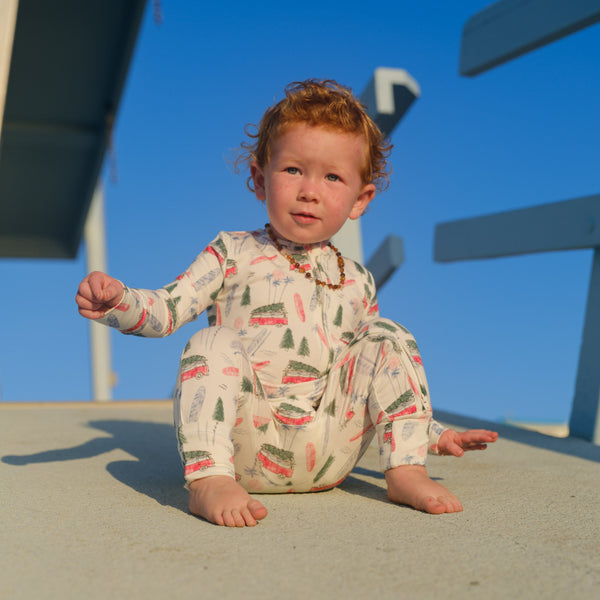 Shwally Romper for babies, stylish design, angle view showcasing soft fabric and vibrant colors.