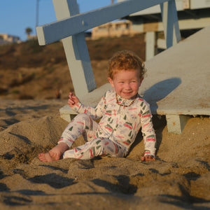 Baby Shwally Romper in a playful angle, showcasing soft fabric and vibrant colors for stylish comfort.