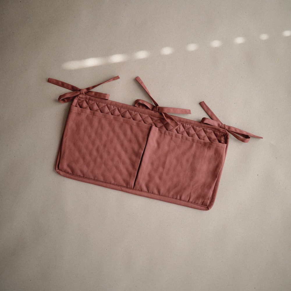 "Main image of a versatile storage pocket for organizing baby essentials efficiently."