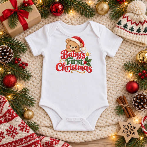 Baby's First Christmas organic cotton baby bodysuit in white, Christmas flat lay