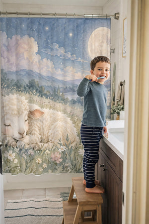 Child brushing teeth in a family bathroom with the Meadow Lamb shower curtain