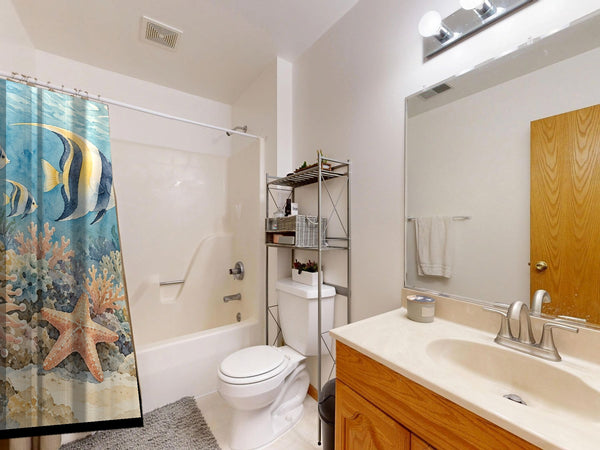 Coral Reef Ocean shower curtain on a tub shower combo in an American family bathroom