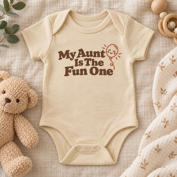 Styled flat lay of the My Aunt Is The Fun One baby bodysuit