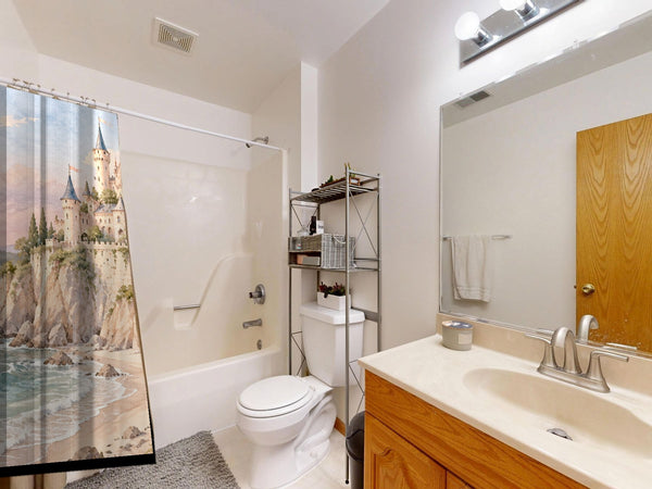Seaside Castle Fairy Tale shower curtain on a tub shower combo in an American family bathroom