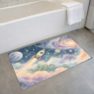 Rocket Journey bath mat on the floor in front of the tub