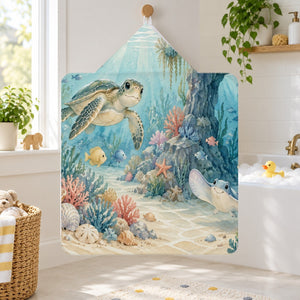 Treasure Cove Ocean kids hooded bath towel hanging in a kids bathroom