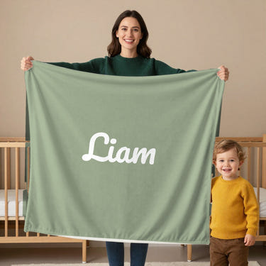 Classic Name toddler minky blanket in sage, held by a mom