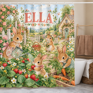 Personalized bunny garden shower curtain with the name Ella hanging in a kids bathroom