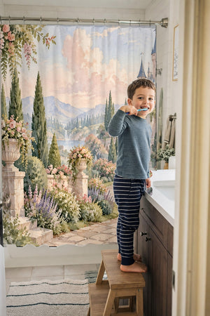 Child brushing teeth in a family bathroom with the Castle Garden Fairy Tale shower curtain