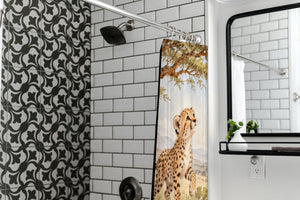 Cheetah Cub Safari shower curtain in a modern farmhouse bathroom with subway tile