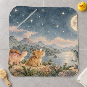Moonlit Dinosaurs kids hooded bath towel laid flat