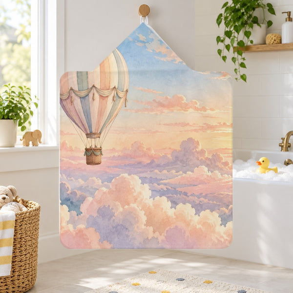 Sunrise Hot Air Balloon kids hooded bath towel hanging in a kids bathroom