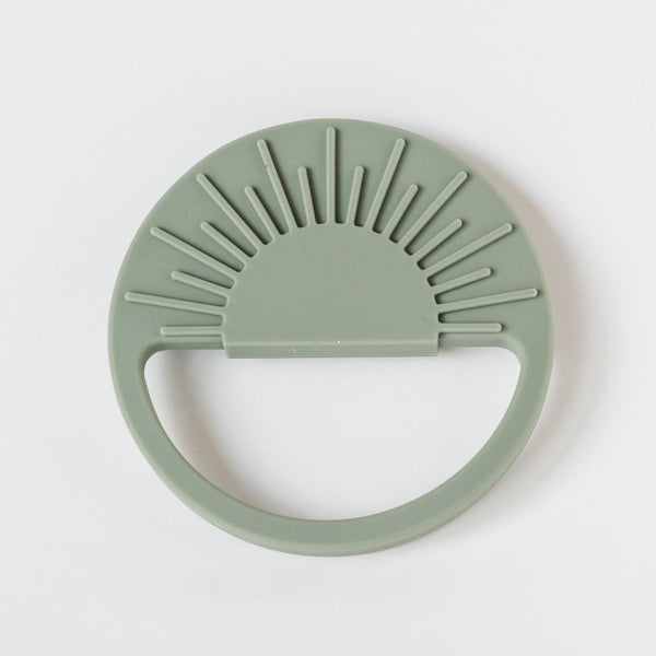 Sage Sunburst Teething Toy for babies, designed for soothing gums and promoting sensory development.