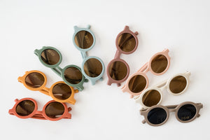 Purple retro sunglasses for toddlers and kids, stylish and fun accessory for sunny days.