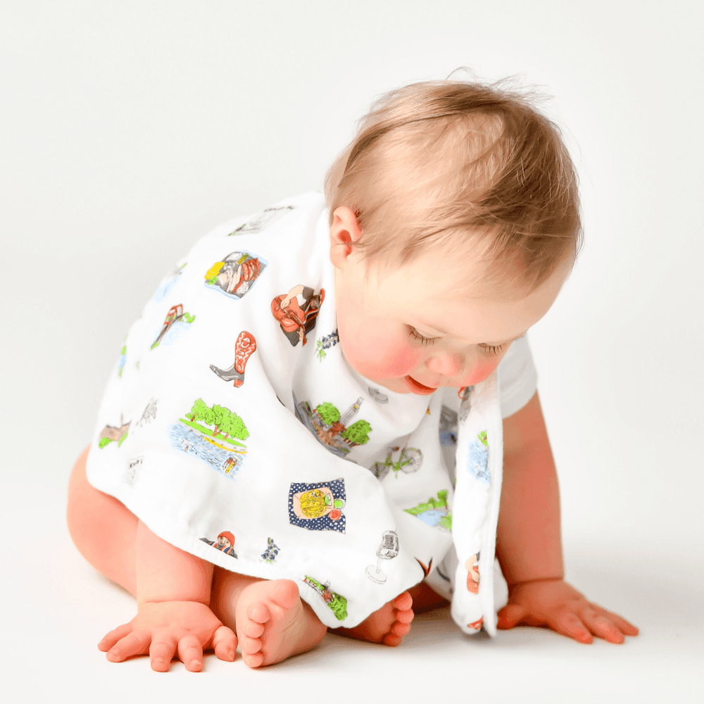Austin Baby Muslin Swaddle Blanket and Burp Cloth/Bib Combo Gift Set for infants, soft and stylish baby essentials.