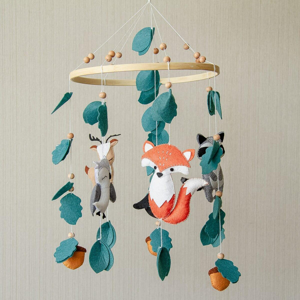 Handmade forest-themed baby mobile, perfect for nursery décor and accessories.