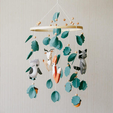 Handmade forest-themed baby mobile, perfect for nursery décor and accessories.