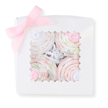 Baby girl cupcake set featuring a cute bunny design, perfect for swaddling and cozy blankets.