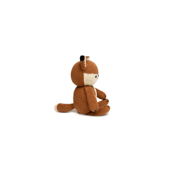 Knit baby fox doll in a playful pose, perfect for cuddles and imaginative play.