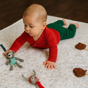 Scarlet red long sleeve bodysuit for babies, angle 5 view showcasing soft fabric and stylish design.
