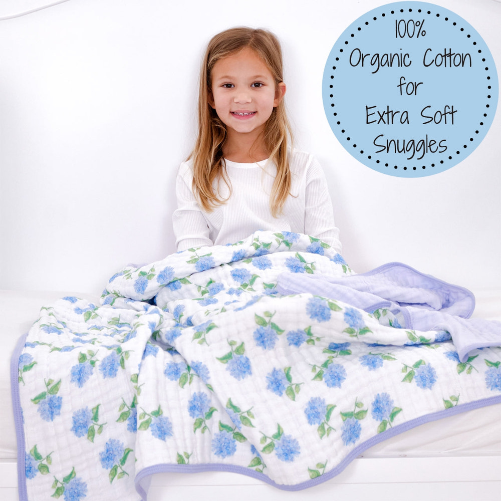 Cotton muslin hydrangea quilt for babies, soft and breathable, perfect for cozy naps and stylish nursery decor.
