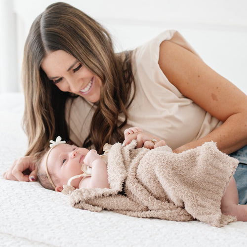 BAMBONI® Mini Blankets in soft fabric, perfect for swaddling and keeping babies cozy. Angle 3 view.