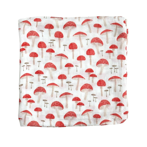 Bamboo muslin swaddle blanket in The Fun-gis design for babies, soft and breathable for comfort and style.