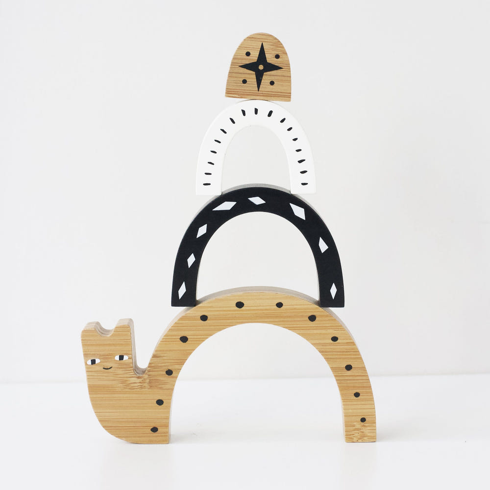 Bamboo Nesting Snail wooden toy for babies, promoting fine motor skills and imaginative play.