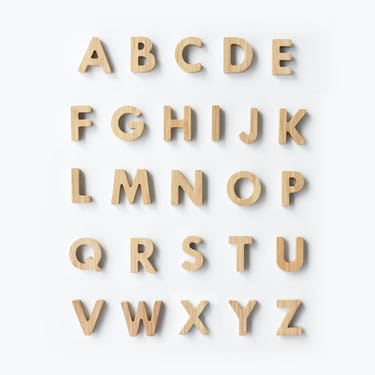 Bamboo Alphabet wooden toy set for babies, promoting early learning and creativity.