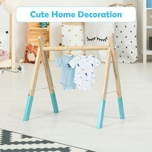 Portable wooden baby gym with teething toys, perfect for newborns, shown from angle 8.