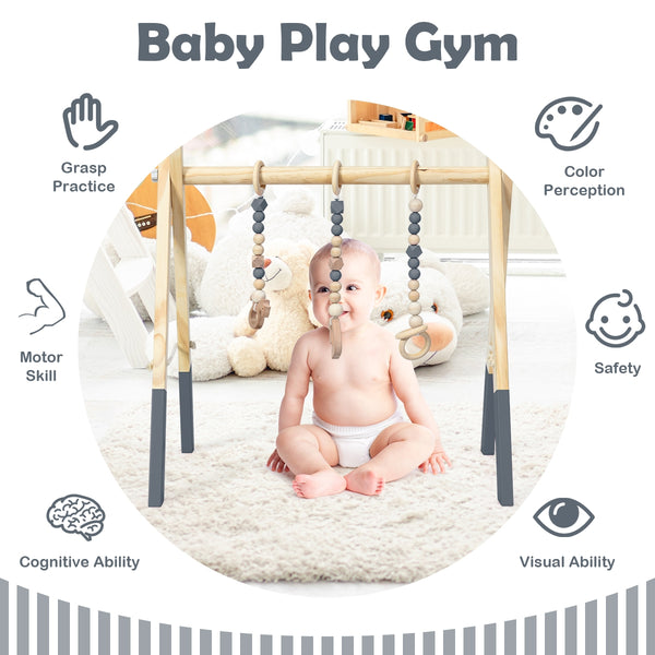 Portable wooden newborn activity gym with teething toys, angled view showcasing hanging bar for baby playtime.