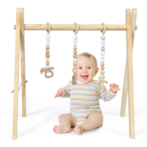 Portable wooden newborn activity gym with teething toys, perfect for baby playtime and development.