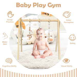Portable wooden newborn activity gym with teething toys, hanging bar, and stylish design for baby playtime.