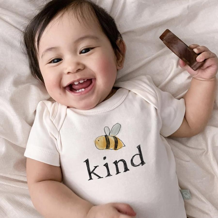 Graphic bumble bee bodysuit for babies, short sleeve design, perfect for playful and stylish outfits.