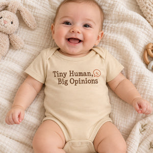 Baby wearing the Tiny Human, Big Opinions baby bodysuit