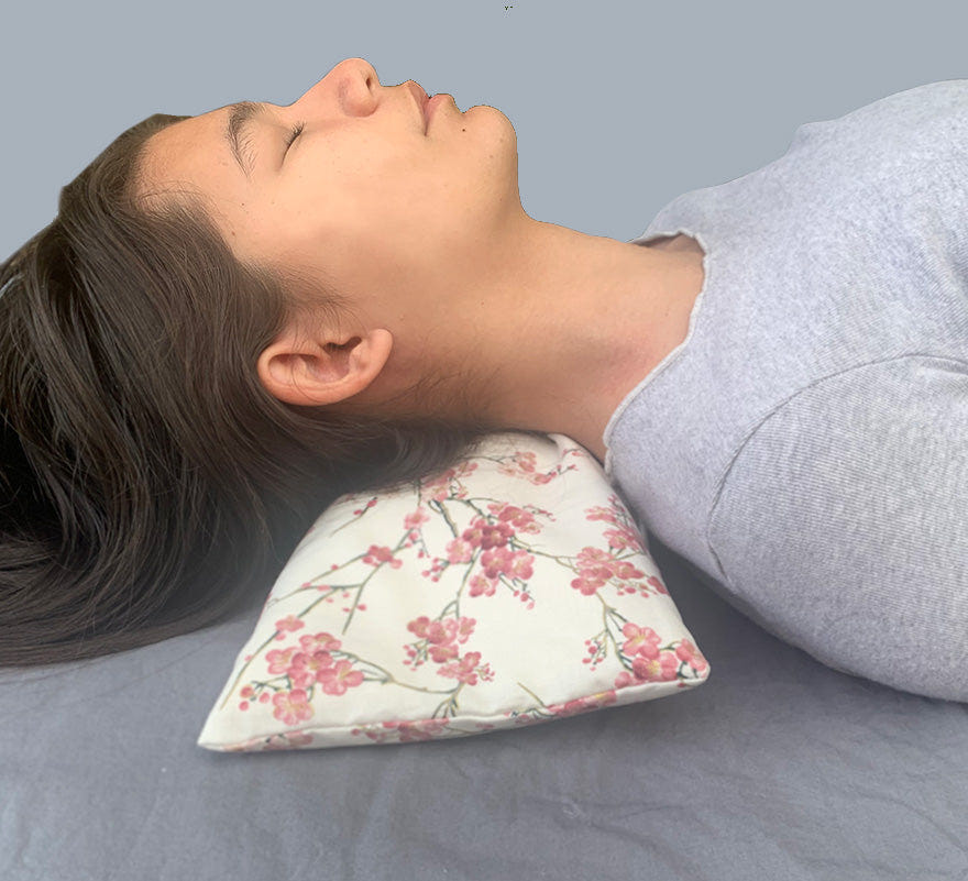 Hot Cherry cervical neck pillow in unbleached denim with cherry blossom pillowcase, perfect for comfort and support.