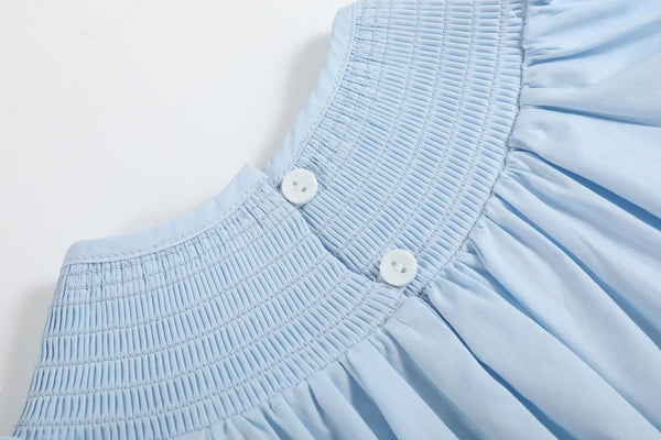 Blue and pink bow smocked romper for babies, stylish and comfortable, perfect for any occasion.