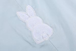 Blue fuzzy bunny overalls for babies, shown from angle 3, perfect for playful and cozy outfits.