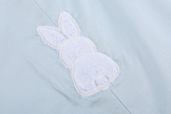 Blue fuzzy bunny overalls for babies, shown from angle 3, perfect for playful and cozy outfits.